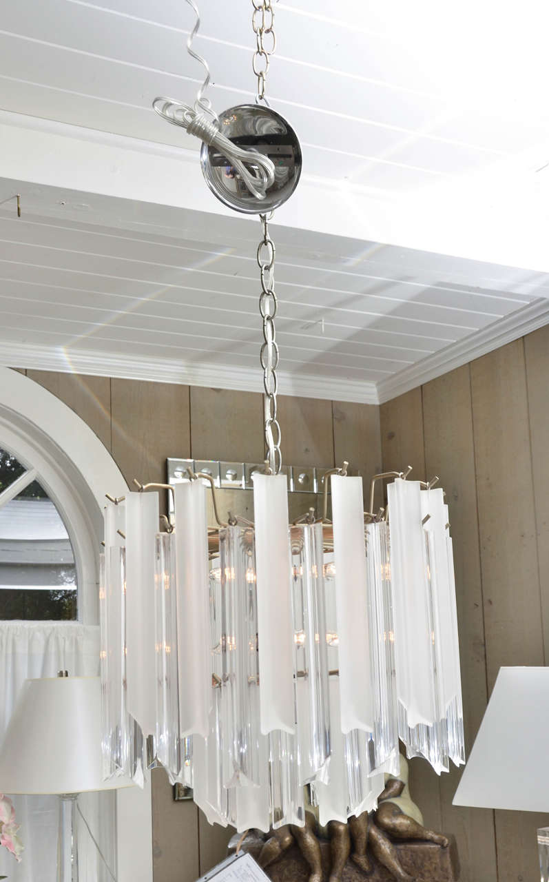 Vintage round Lucite chandelier with alternating clear and frosted Lucite pendants