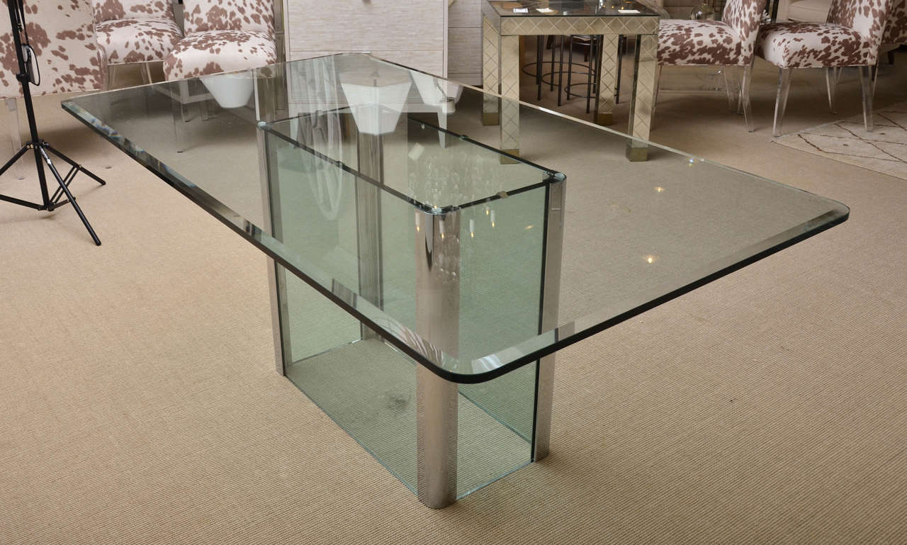 Dining table with chrome and glass single pedestal base by Leon Rosen for the Pace Collection. The top is 3/4 in tempered beveled glass.
