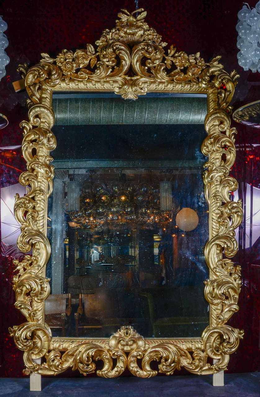 Huge 19th century giltwood mirror, original mercury mirror, and gilt beautifully, beginning 19th century.