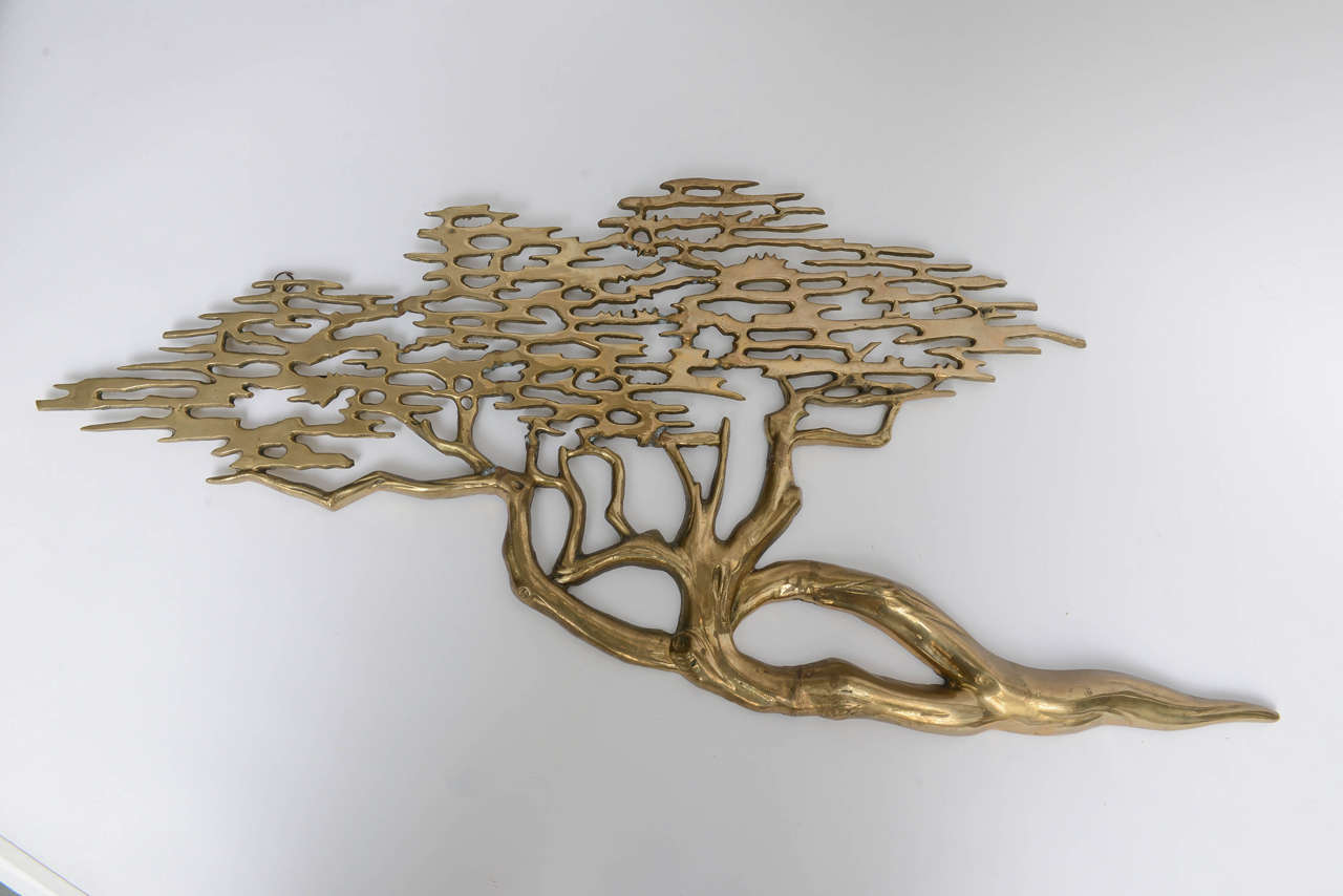 Great wall tree sculpture in brass.