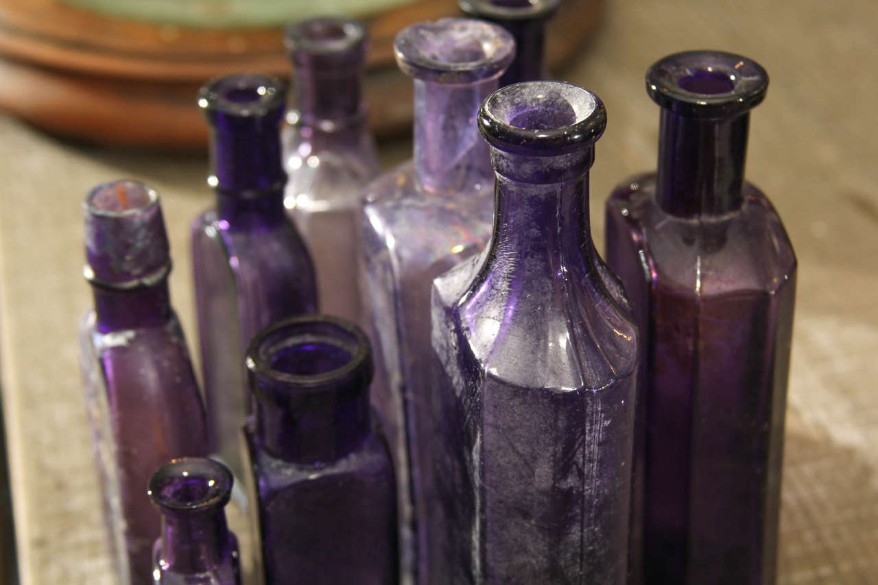Set of Nine Purple Bottles 1