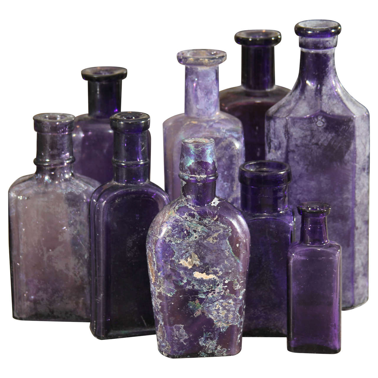 Set of Nine Purple Bottles