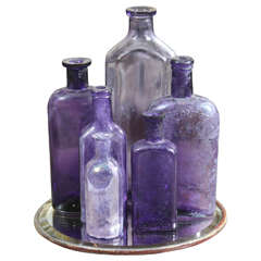 Group of Six Purple Bottles