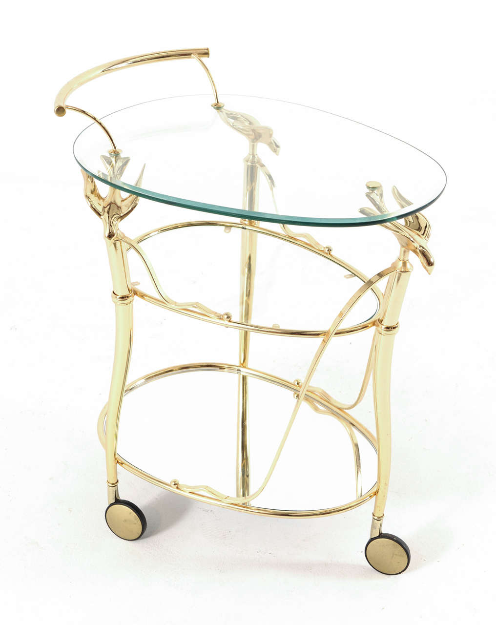 Absolutely stunning heavily gilded trolley on three wheels decorated with hummingbirds.
It has three glass levels of which the lower a mirror and the upper very thick glass to place bottles and glasses; or the morning breakfast plate. This is a