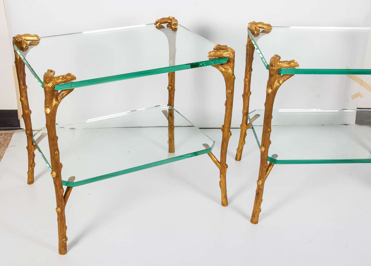 Pair of Art Deco style faux bois gilt bronze and glass two-tier etageres, coffee tables or side tables signed by P. E. Guerin (signed underside the feet). Very nicely detailed and hand chizzeled 