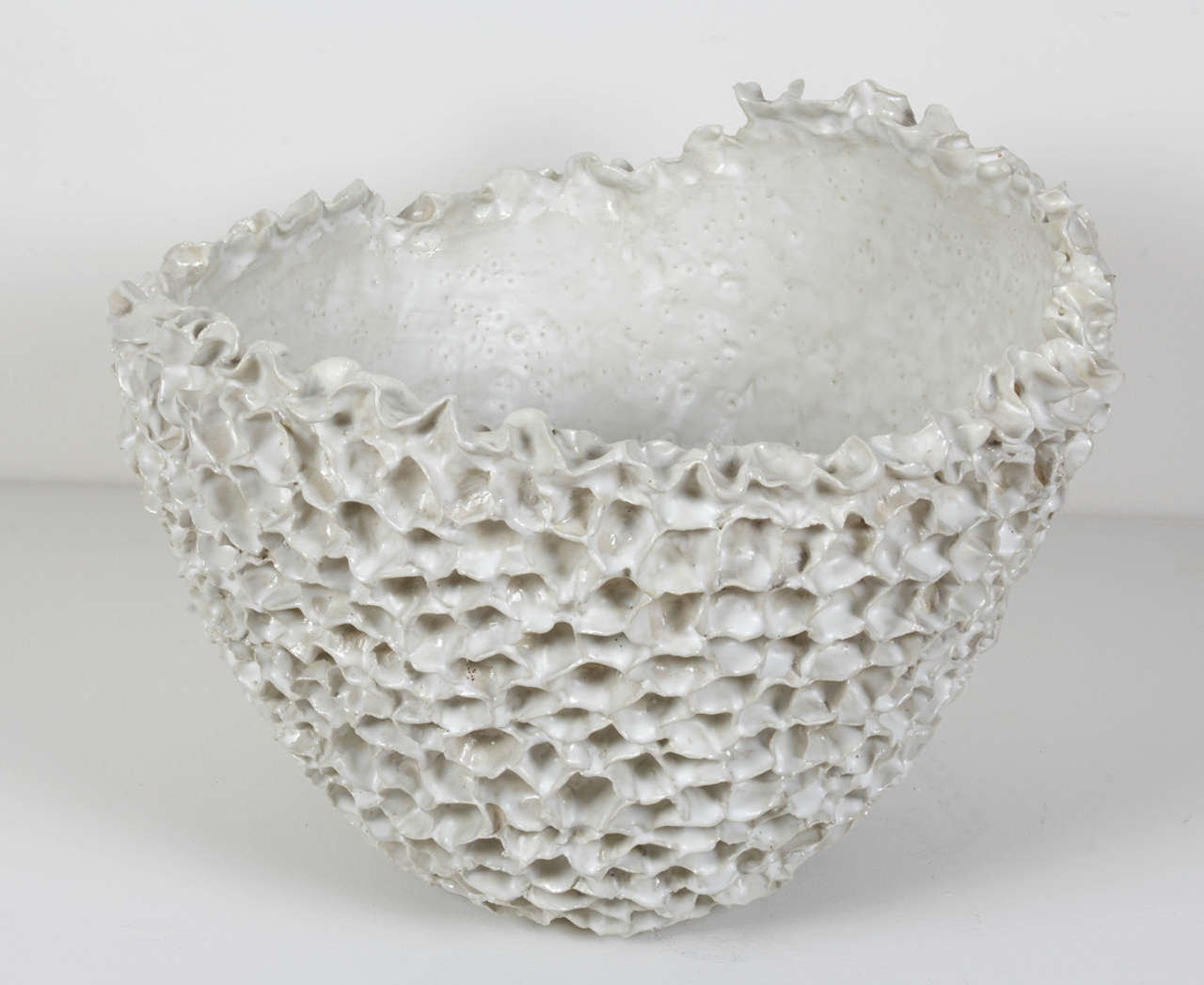 French contemporary sculpted ceramic bowl, cream glaze.

Signed: Vissiere.
