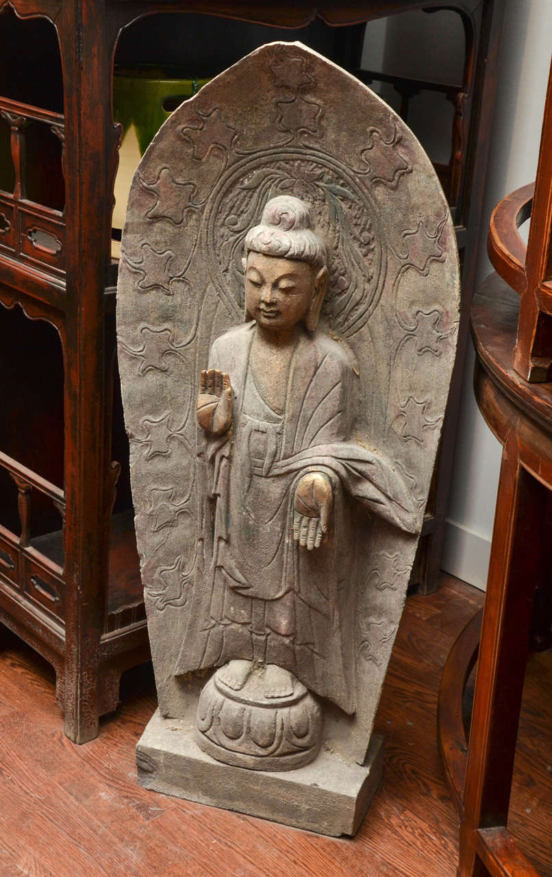 Mid-Century Chinese carved limestone Buddha with gold leaf trim 