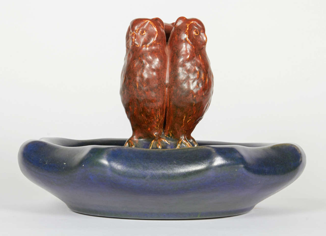 This figurative owl vessel is distinctive in both it's form and glaze. It's matte finish and deep rich coloring make it an exceptional piece of decorative pottery.