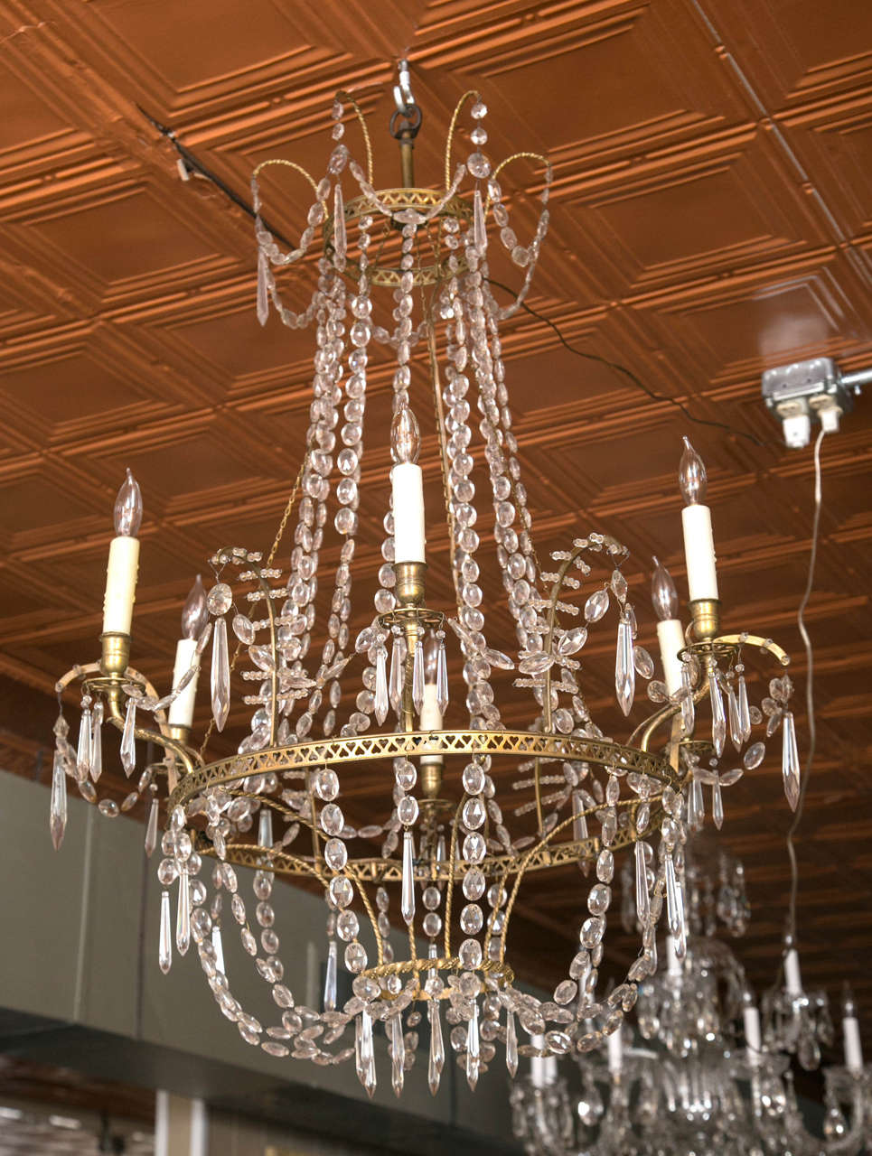 The bronze on this Baltic chandelier is very fine quality. This is an elegant chandelier from top to bottom with wonderful detail. Both rims are pierced with hearts. This six-light chandelier is a gem.