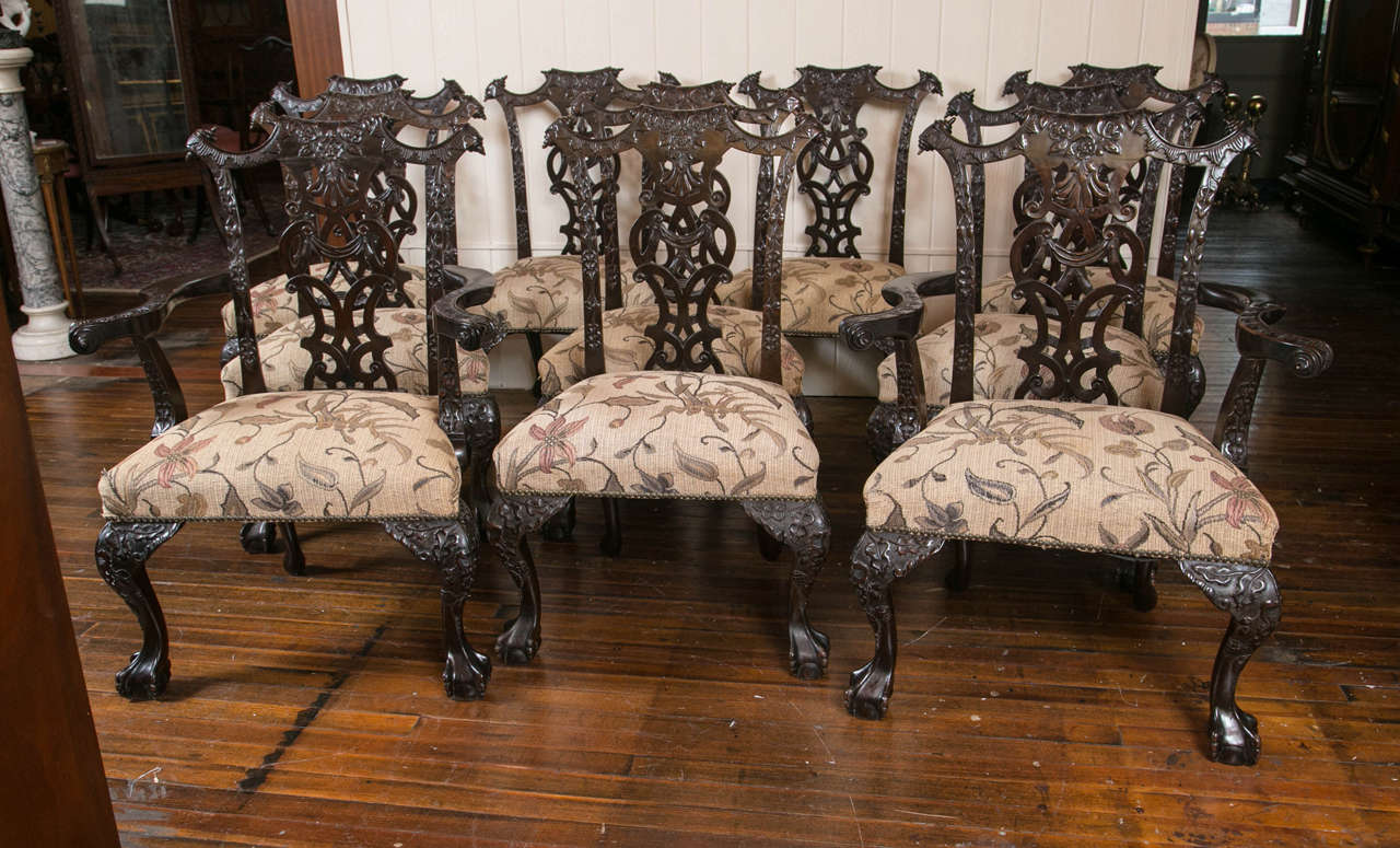 A truly fantastic set of ten of the finest quality carved mahogany dining chairs
done in the Chippendale style, this set has eight sides and two arms, 19th century.
Made from good quality, dense mahogany, these chairs are very heavy.

Measures: