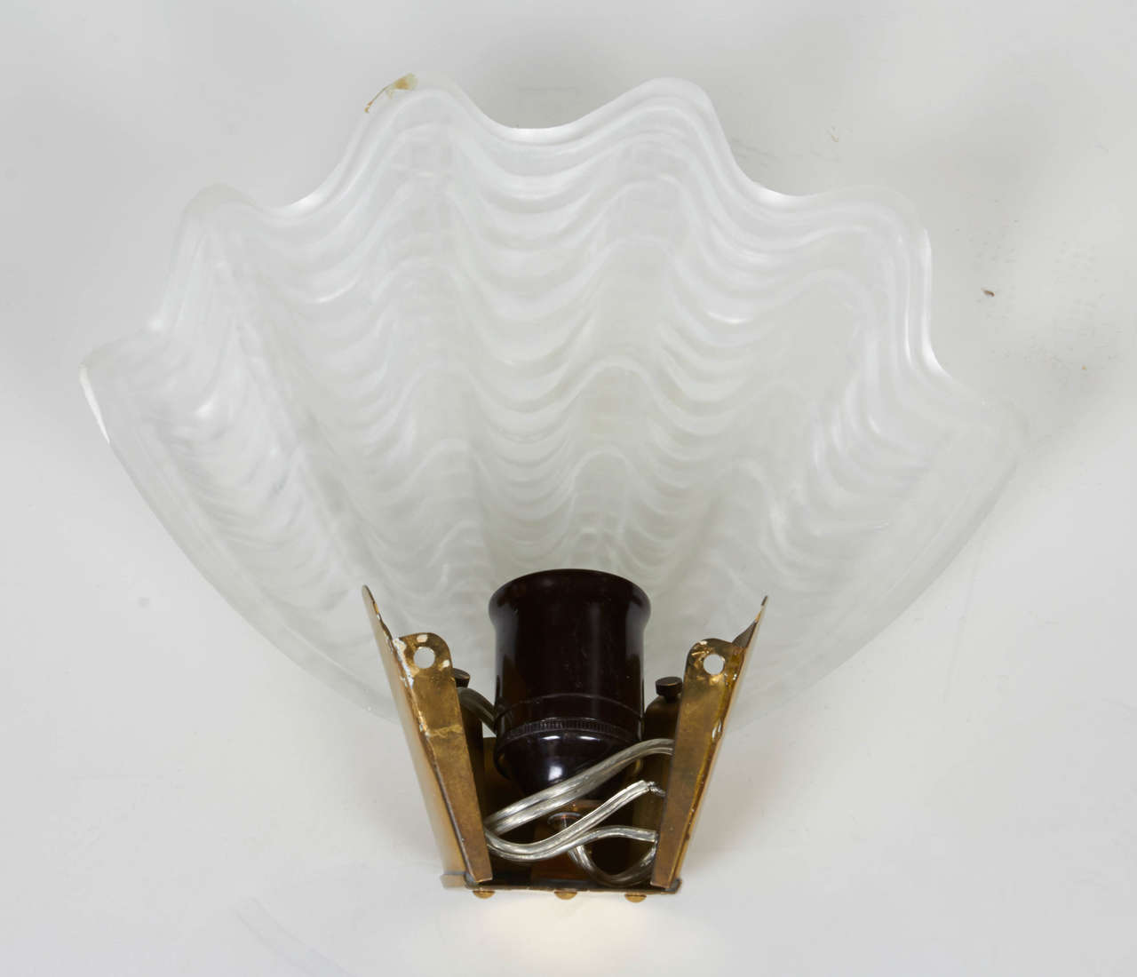 Brass Pair of French Art Deco Sconces with Elegant Shell Design