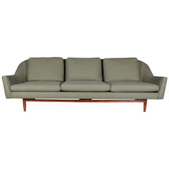Jens Risom Three-Seat Sofa with Curved Shape on Solid Walnut Frame