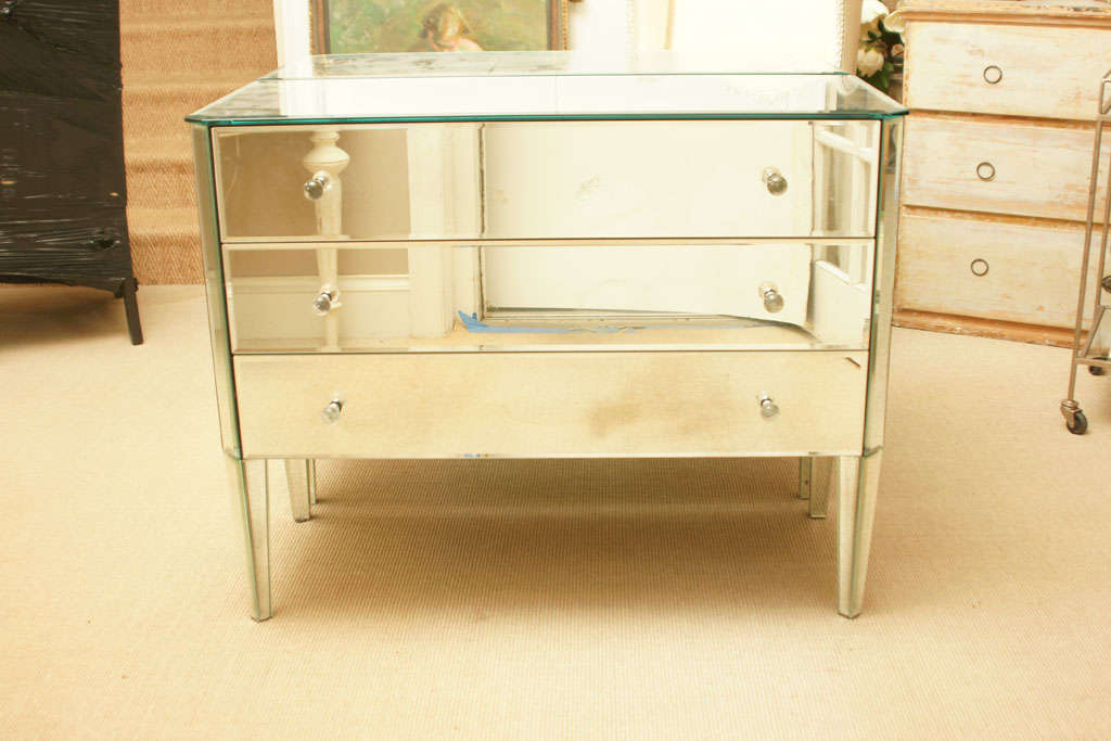 Beautifully made pair of Venetian 3-drawer mirrored commodes. All surfaces are mirrored including the backs and all mirror is beveled.