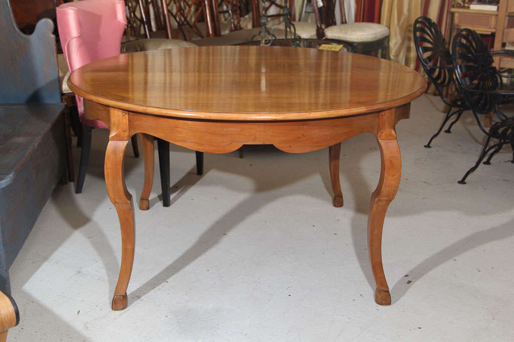 Round  Extension  Dining  Table  by Frederick  Victoria