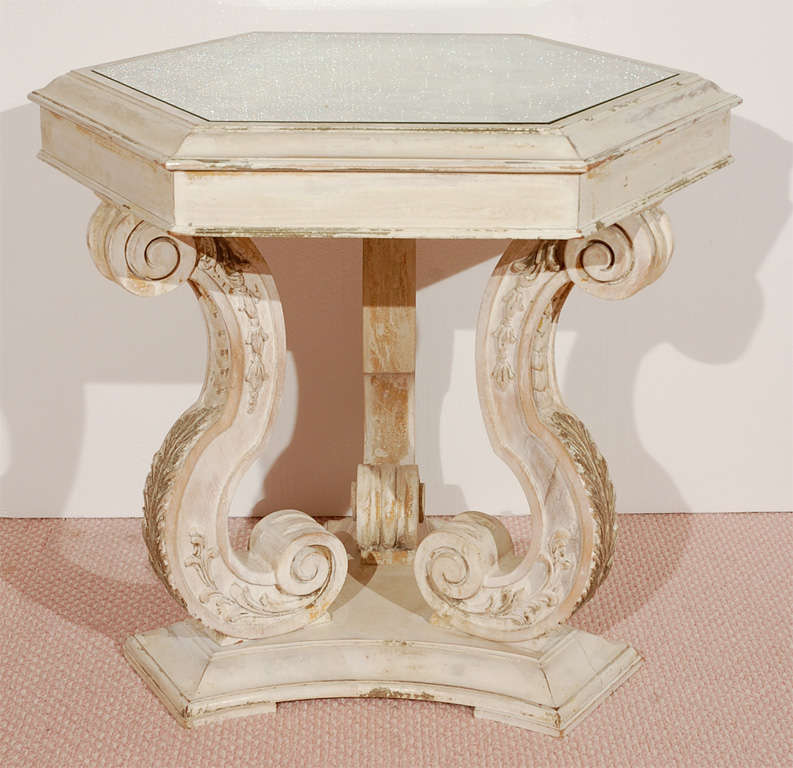 Vintage 1970's Italian style side table with hand carved details throughout. Painted top.