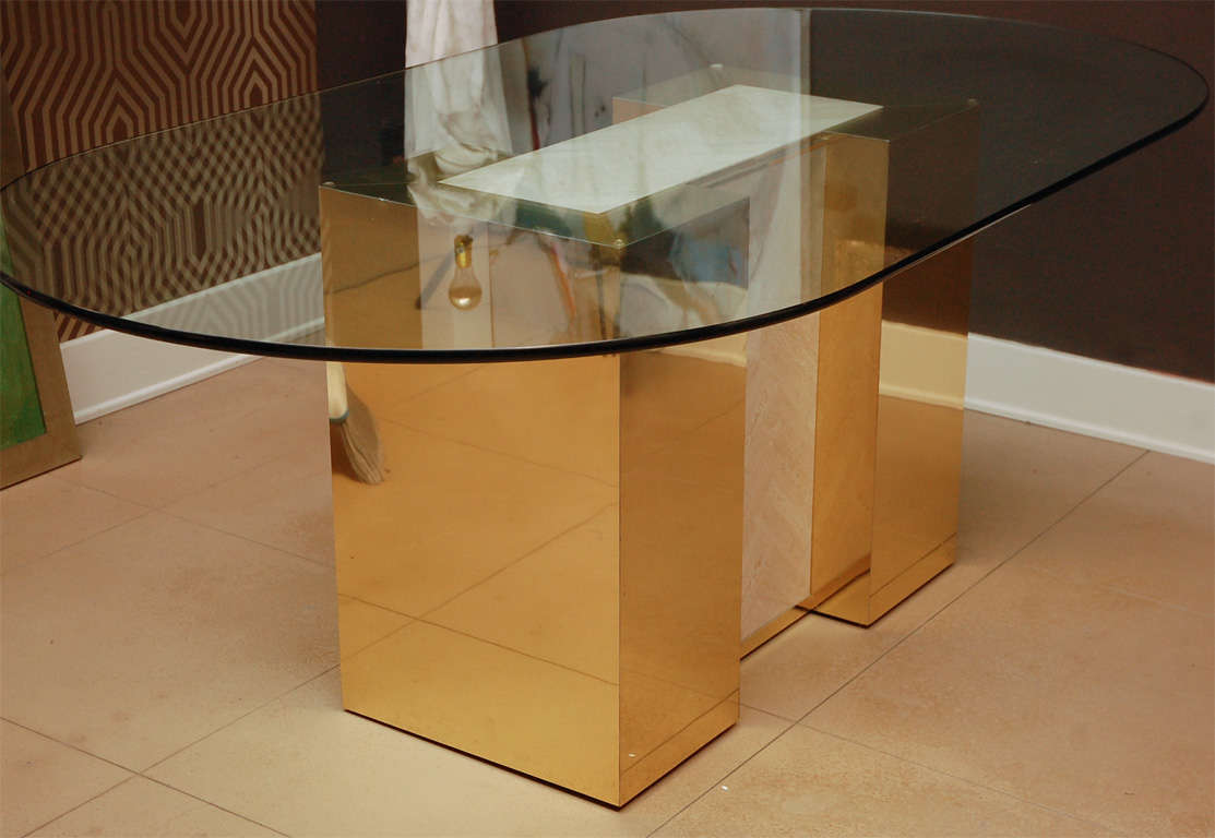 Rectangular brass and marble table base with oval glass top in the style of Milo Baughman.