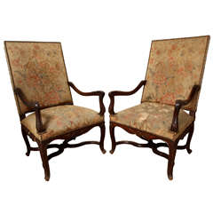 A Pair of French Louis XV-style Carved Walnut Open Armchairs