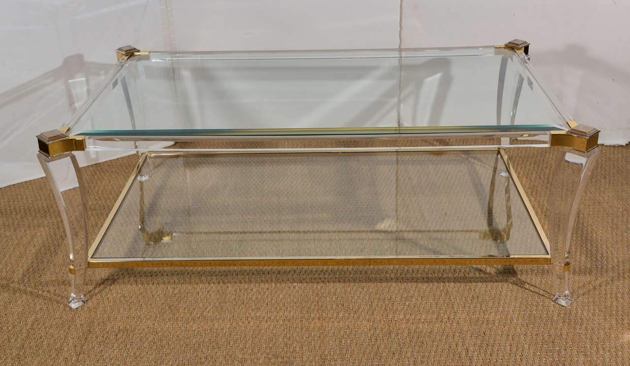 Lucite and brass saber legged 2 tier coffee table, Italy, circa 1970's