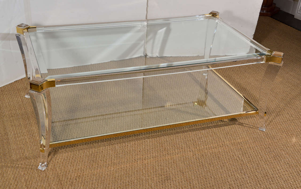 Italian Lucite And Brass Saber Legged Coffee Table In Good Condition In Dallas, TX