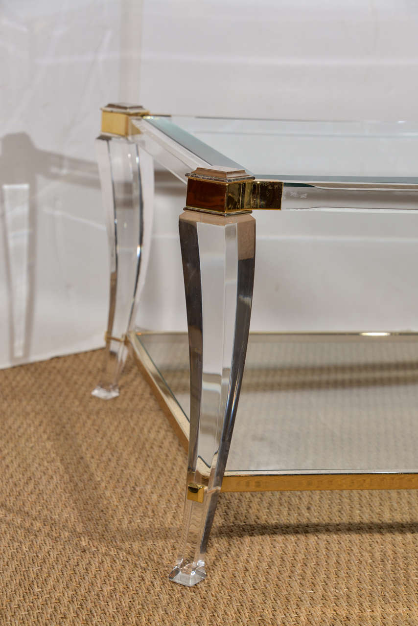Late 20th Century Italian Lucite And Brass Saber Legged Coffee Table