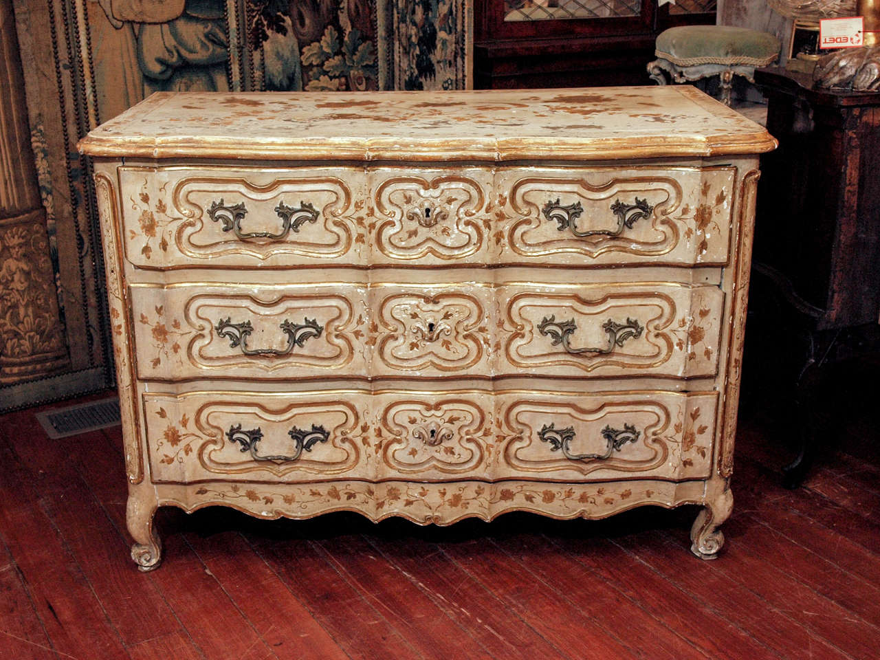 Louis XV Parcel Gilt and Painted over walnut Provencal Commode with three drawers.