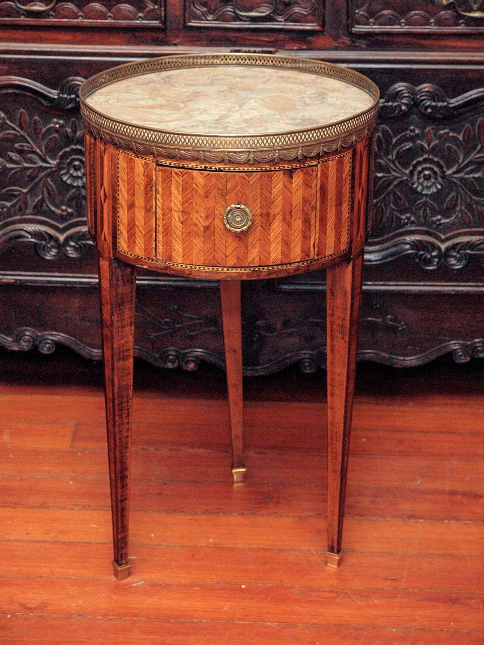 Louis XVI Marquetry marble topped galleried table