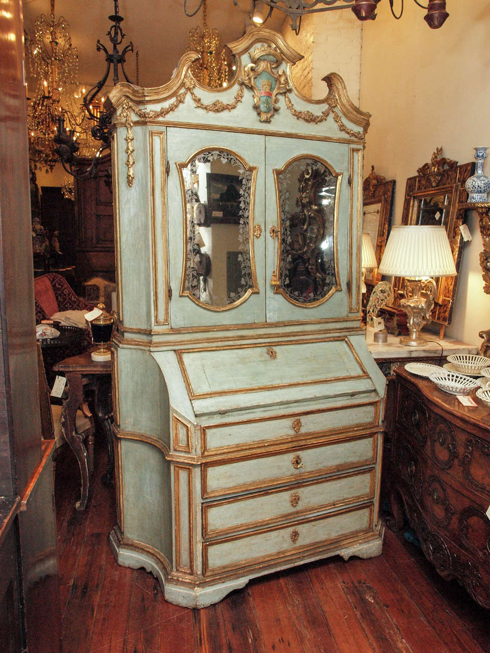 18th c. Paint and Parcel Gilt Etched Mirror Door Secretary Bookcase with family crest.