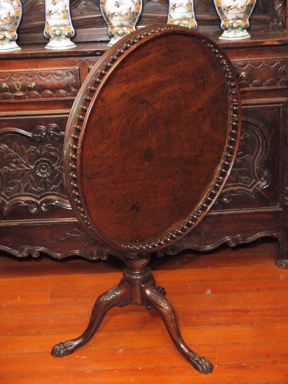 English George III Galleried Mahogany Tilt top Table with trifed base and balustraded gallery.