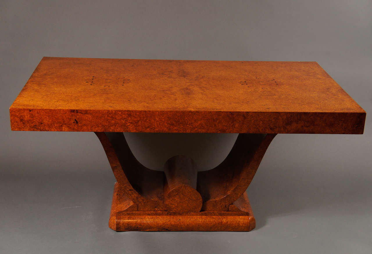 French Art Deco amboyna wood table.
Wonderful design, spectacular amboyna burl pattern, with two drawers on either side.