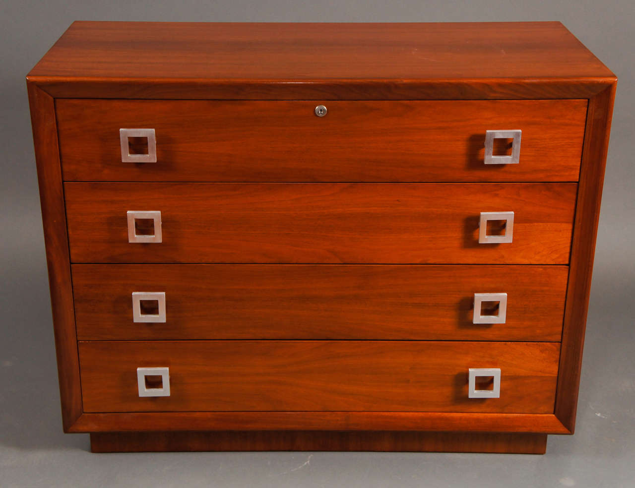 Pair of American chest of drawers walnut with aluminium pulls.