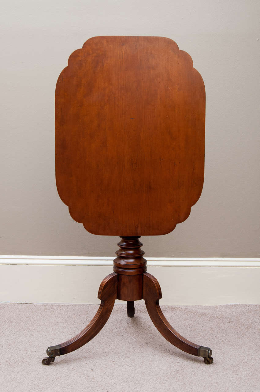 This cherry table was probably made in Connecticut very early in the 19th century it has an excellent hand-turned pedestal with spiral reeding on the urn centre - graceful reeded legs the table was hand restored about 40 years ago. Excellent patina.