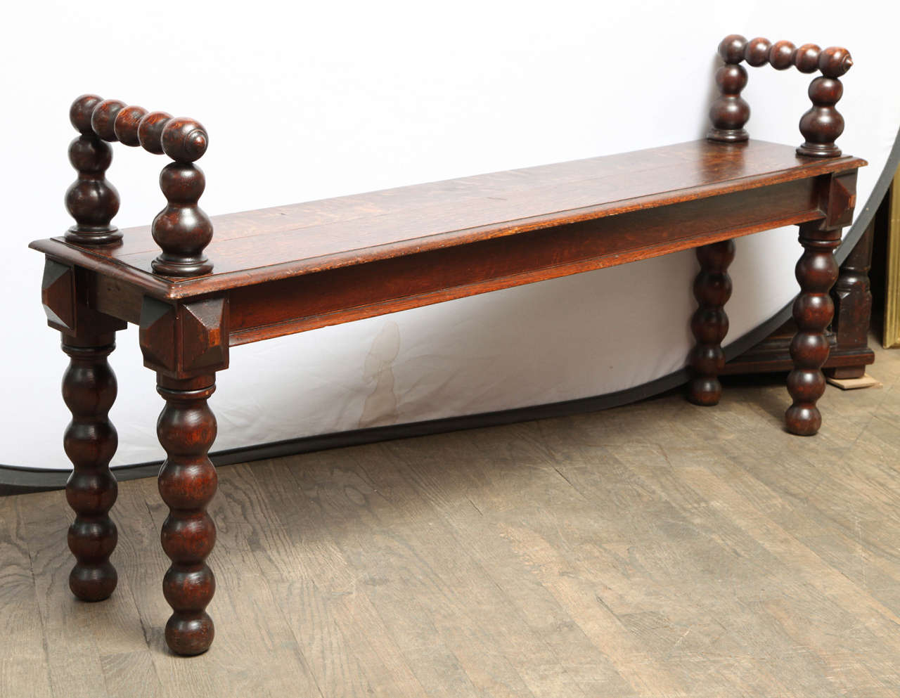 UK, circa 1880.

In excellent condition. Handmade in England by furniture makers in the Manchester area. Rare bobbin bench design.

Handpicked by buyers at Ann-Morris, Incorporation.