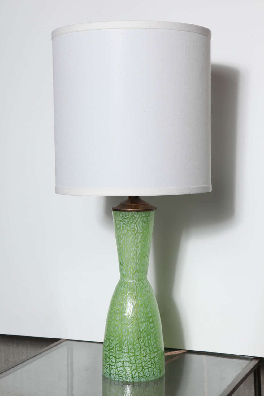 Lovely green in a classic hourglass shape.  Total height with shade is 22