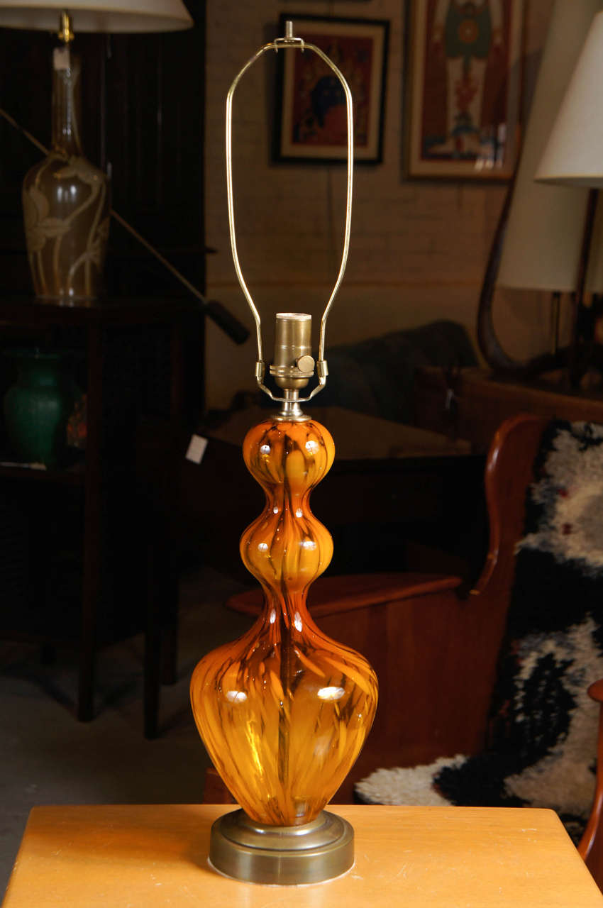 Understated Elegant Venini  amber glass table lamp. All new brass hardware and wiring.