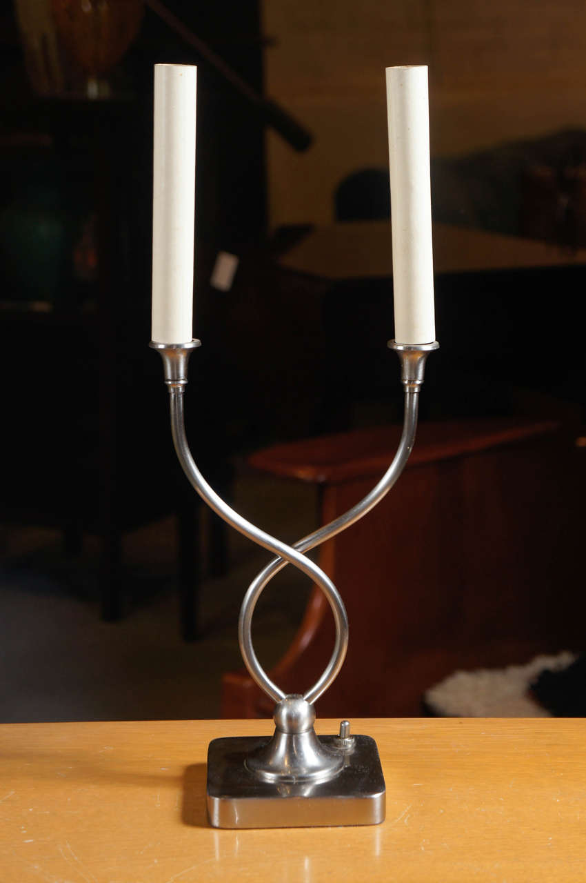 Twisted nickel over brass candelabra lamp. Elegant form. 
American c. 1940