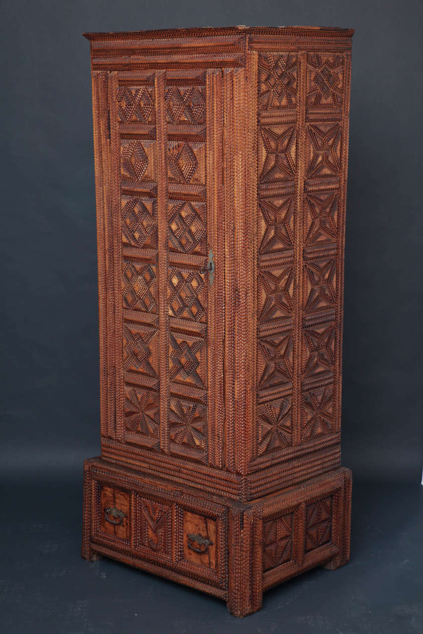 Fine And Substantial Single Door And Drawer Wardrobe With Layered Geometric Patterning.  The Drawer's Center Panel Features The Initials 