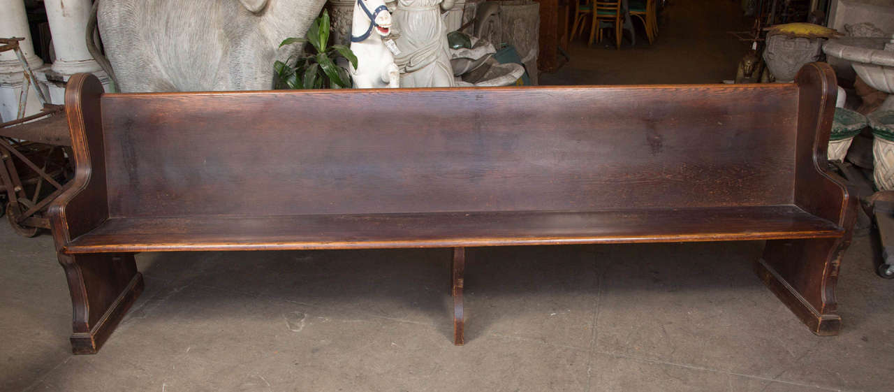 Solid oak church pew with rounded ends. Can be cut down to shorten the length. This can be seen at our store at 1800 South Grand Ave, Los Angeles, CA.