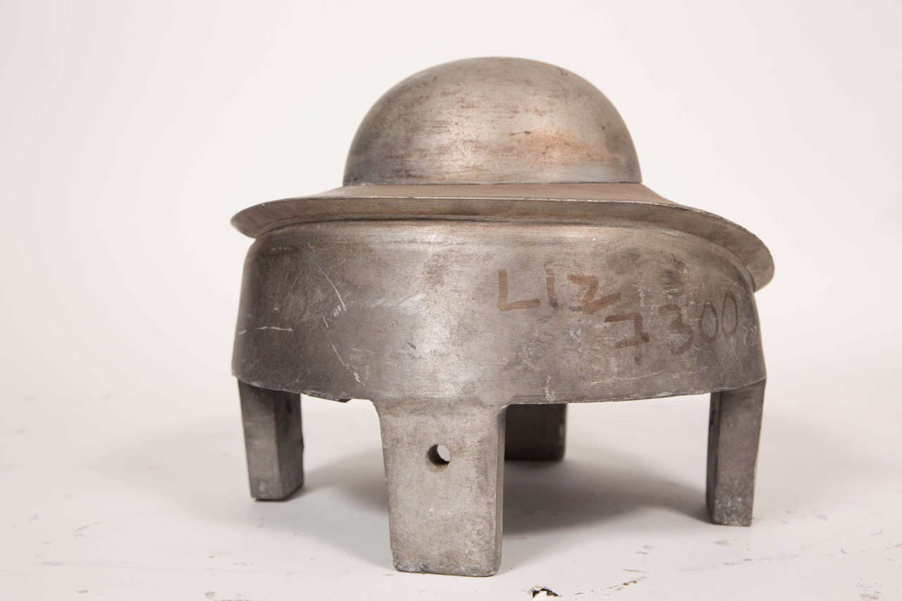 Antique aluminum French hat mold. This can be seen at our 1800 South Grand Ave, Los Angeles store.