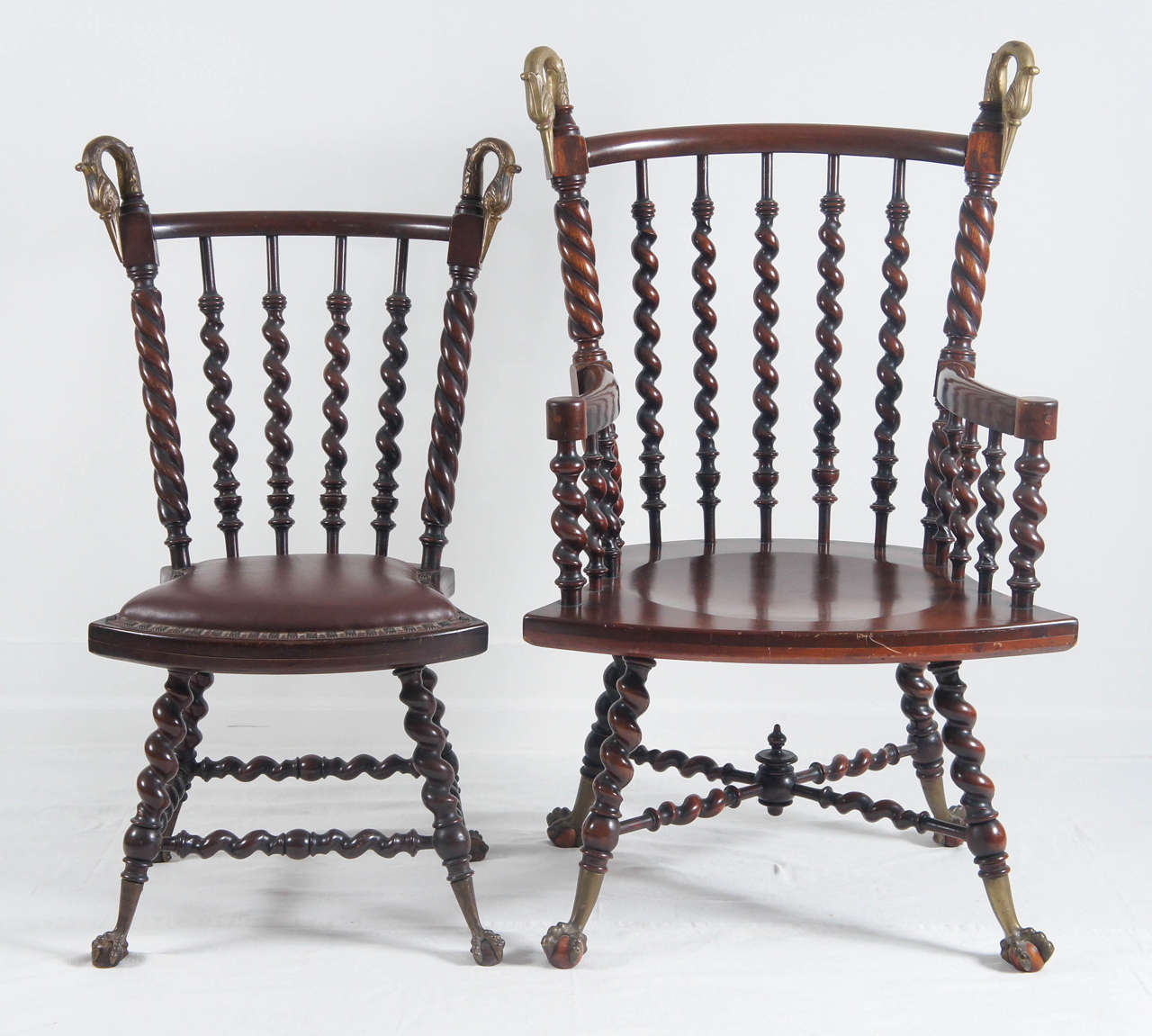 a great pair of antique chairs.
His and hers Victorian era spindle chairs.
They are heavy, made from mahogany.
There is age and wear to these old chairs.
They are strong well made chairs that present very well.
Sold as a set.