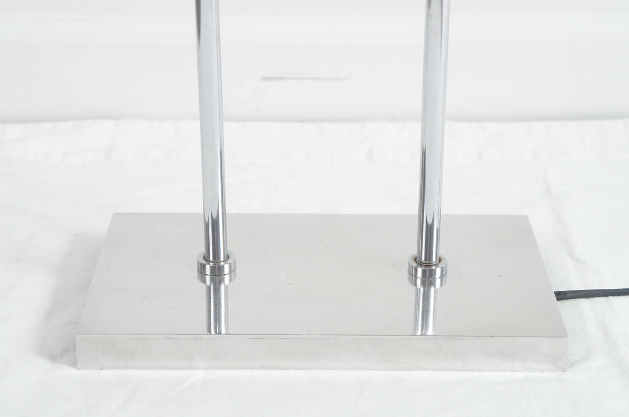 Late 20th Century pair of Space Age Table lamps in polished aluminum by Robert Sonneman For Sale
