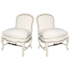 A Pair of Louis XV Style Carved and Painted Slipper Chairs. Mid 20th Century