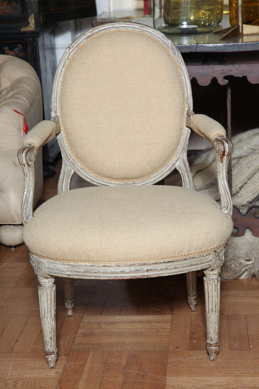 French A Pair of Louis XVI Carved and Painted Beechwood Fauteuils A La Reine