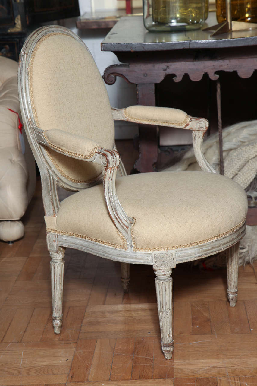 18th Century and Earlier A Pair of Louis XVI Carved and Painted Beechwood Fauteuils A La Reine