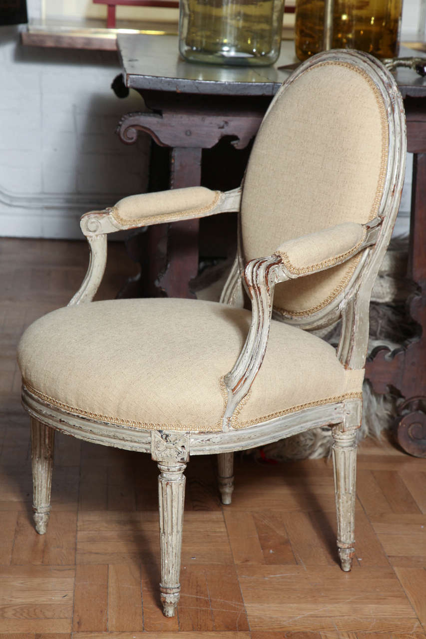 A Pair of Louis XVI Carved and Painted Beechwood Fauteuils A La Reine 5