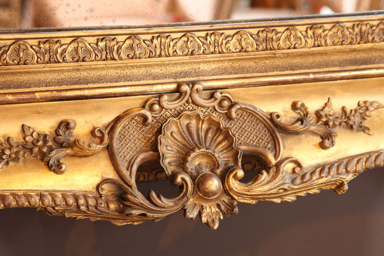 A Louis XV Style Carved and Gilded Mirror. France 19th Century 1