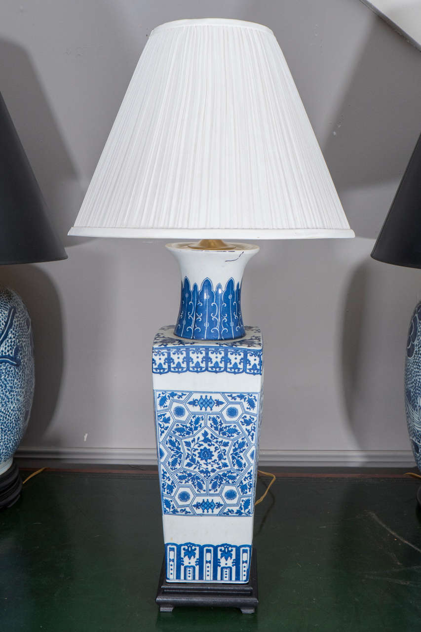 Pair of Chinese Blue and White Porcelain Vases, Wired as Lamps. Shades available separately.

33" H (with harp)
6" W, 6" D (without shade)