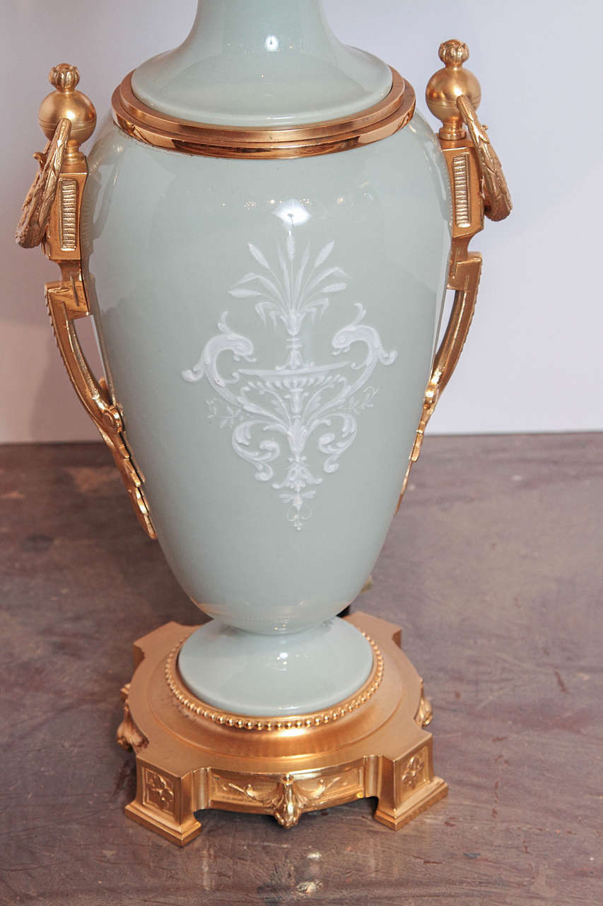 Louis XVI Pair of 19th Century French Celadon Pâte-sur-Pâte Urn lamps