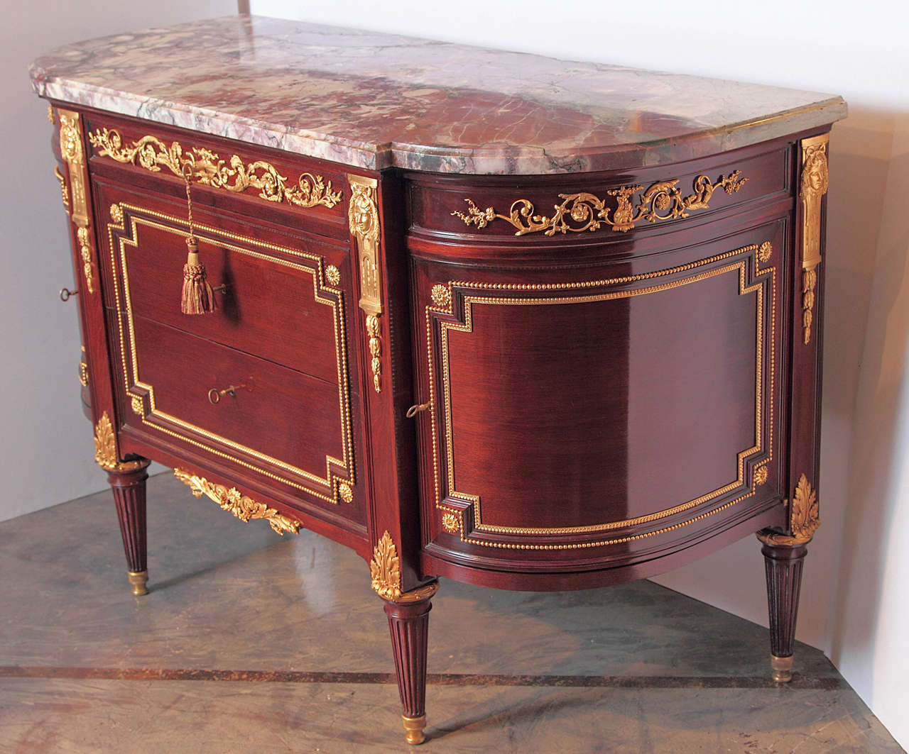 19th century French signed Maison Krieger Louis XVI commode. Original marble top with the finest quality gilt bronze details.