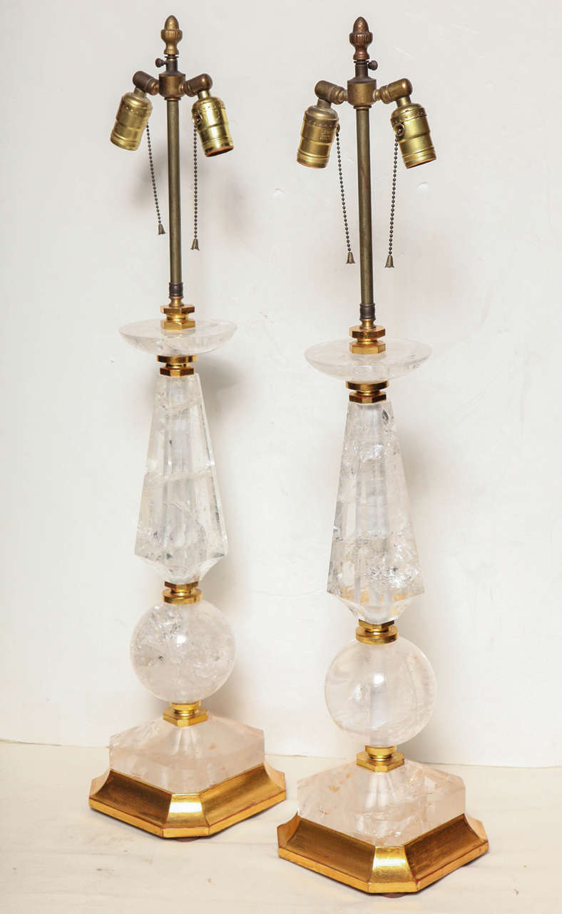 pair of very fine quality classical style Rock Crystal lamps on gilt wood bases.
Stock Number: L32