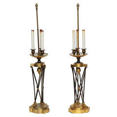 Pair of early 19th century Empire X form bronze lamps